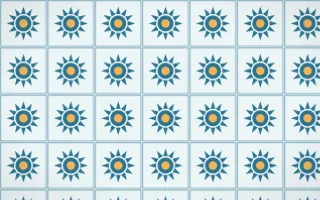 Algarve Sea Sunburst Tile — light blue, orange and white azulejo background