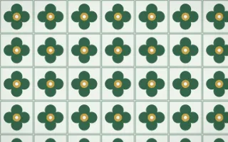 Alhambra Jade Quatrefoil Tile — light green, gold and white azulejo background