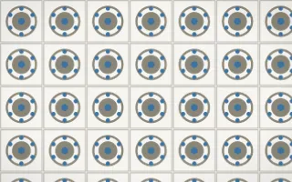 Athens Marble Medallion Tile — light yellow, blue and white azulejo background
