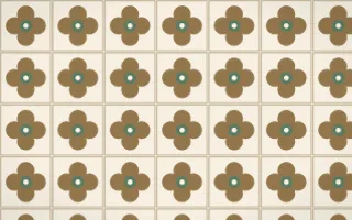 Cotswold Stone Quatrefoil Tile — light orange, green and beige azulejo background