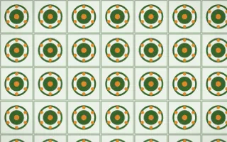 Emerald Isle Medallion Tile — light green, orange and white azulejo background