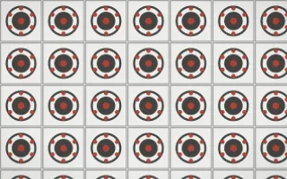 Edo Charcoal Medallion Tile — light grey, red and white azulejo background