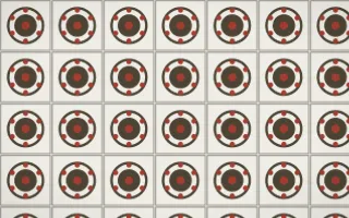 Highland Peat Medallion Tile — light brown, red and white azulejo background