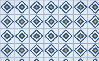 Jodhpur Indigo Diamond Tile — light blue and gold azulejo background