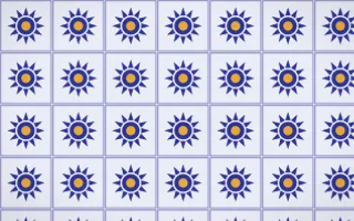 Majorelle Sunburst Tile — light blue, gold and white azulejo background