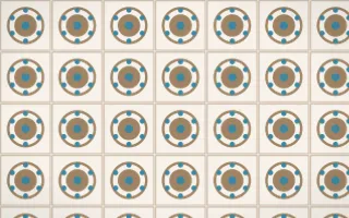 Manila Shell Medallion Tile — light orange, blue and white azulejo background