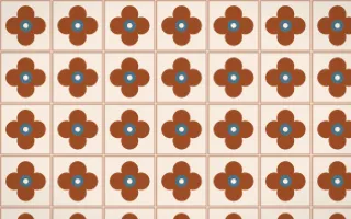Outback Clay Quatrefoil Tile — light brown, blue and beige azulejo background