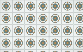Pacific Fog Medallion Tile — light teal, orange and white azulejo background