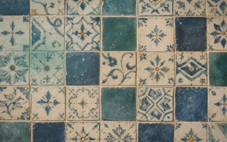 Azulejo Afterglow — light teal and gold azulejo background