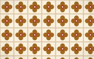 Sevilla Ochre Quatrefoil Tile — light brown, red and beige azulejo background