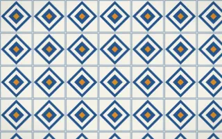 Talavera Puebla Diamond Tile — light blue, orange and white azulejo background