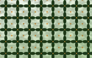 Emerald Isle Batik Kawung — light green, orange and white batik background