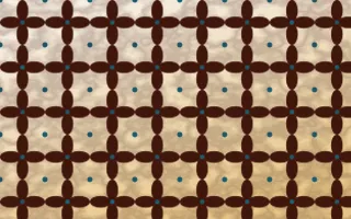Lagos Wax Batik Kawung — light brown, teal and beige batik background
