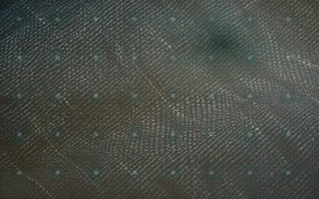 Batik Spotlight — light teal, gold and white batik background