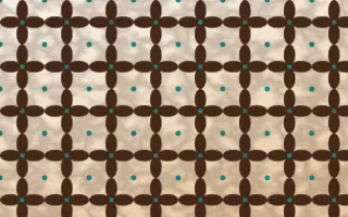 Zanzibar Spice Batik Kawung — light brown, teal and beige batik background