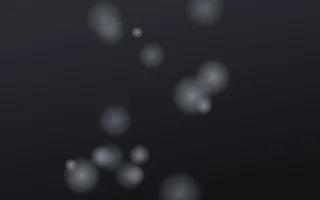Graphene Glow — dark grey and black bokeh background