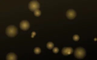 Onyx Gilt Glow — dark black and gold bokeh background