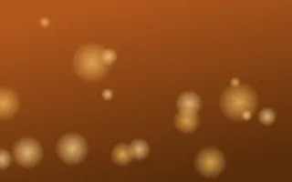 Saffron Fire Glow — dark brown and yellow bokeh background