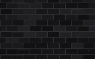 Matte Black Brick — dark black and grey brick wall background