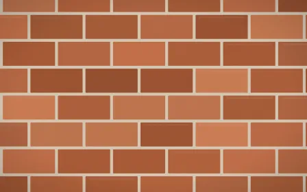 Terracotta Wall Loft — colourful orange and beige brick wall background