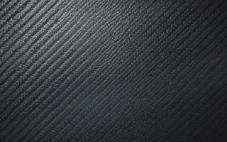 Carbon High Key — dark blue carbon fibre background