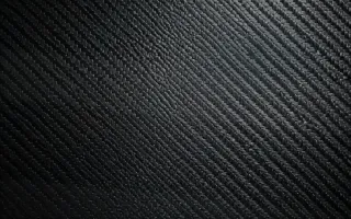 Carbon Morning Haze — dark teal and black carbon fibre background