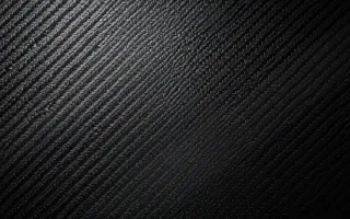 Carbon Overcast — dark grey and black carbon fibre background