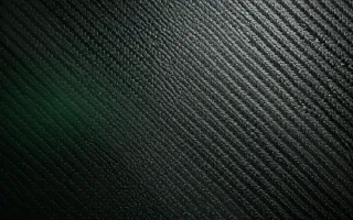 Carbon Side Light — dark green and black carbon fibre background