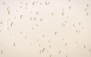 Mocha Milk Moons — light orange and white celestial background