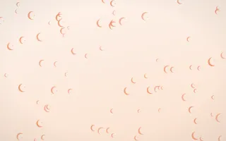 Peach Fuzz Moons — light orange and white celestial background