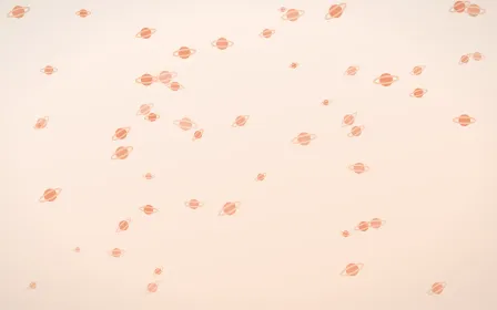 Peach Fuzz Planets — light orange and white celestial background