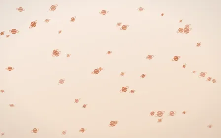 Terracotta Planets — light orange and beige celestial background