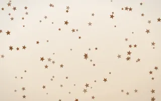 Cocoa Stars — light brown, orange and white celestial background