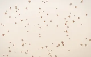 Mocha Milk Stars — light orange and white celestial background