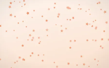 Peach Fuzz Stars — light orange and white celestial background