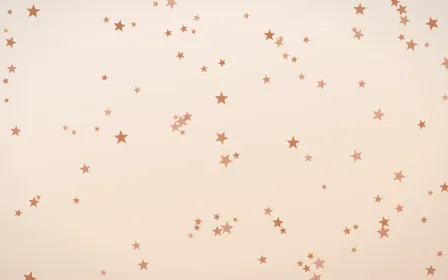 Terracotta Stars — light orange and beige celestial background