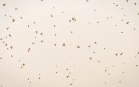 Mocha Milk Twinkles — light orange and white celestial background
