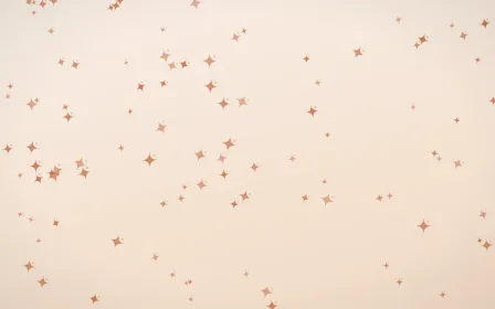 Terracotta Twinkles — light orange and beige celestial background