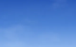 Ultramarine Noon — colourful blue and white cloud background