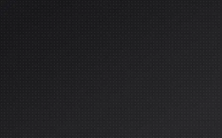 Charcoal Pinpoints — dark black and grey dot pattern background