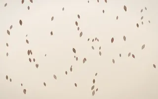 Espresso Leaves III — light brown, orange and beige floral background, variation III
