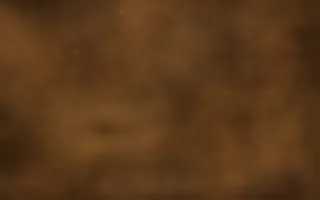 Amber Dust Lane Nebula — dark black, brown and orange galaxy background