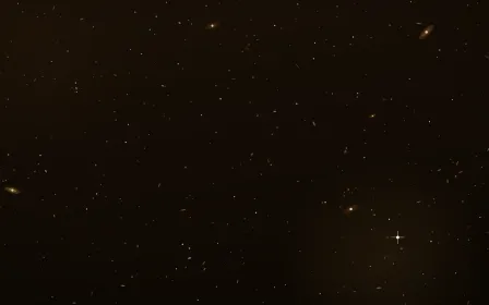 Saffron Nursery Deep Field — dark black and orange galaxy background