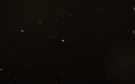 Sepia Drift Deep Field — dark black, brown and orange galaxy background