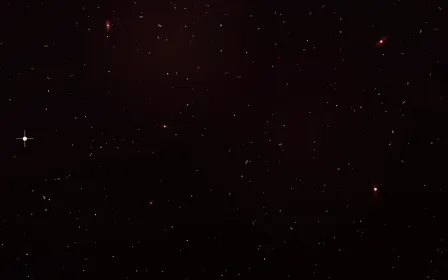 H-Alpha Storm Deep Field — dark black and red galaxy background