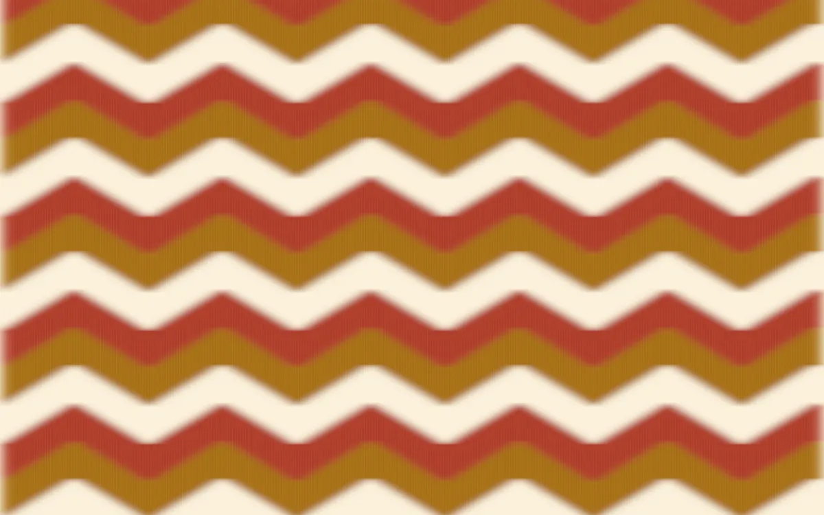 Fes Saffron Ikat Chevron — colourful brown, red and beige ikat background