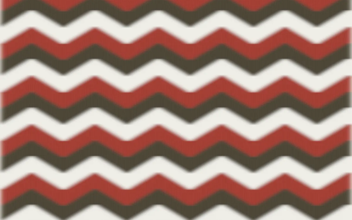 Highland Peat Ikat Chevron — colourful brown, red and white ikat background