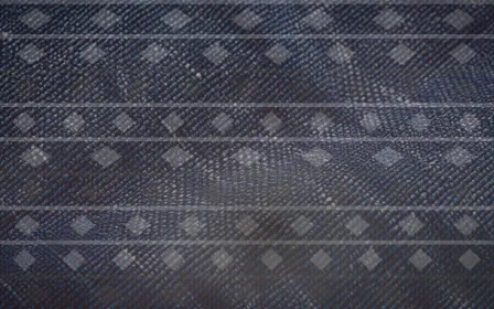 Ikat Cool Studio — colourful brown, red and white ikat background