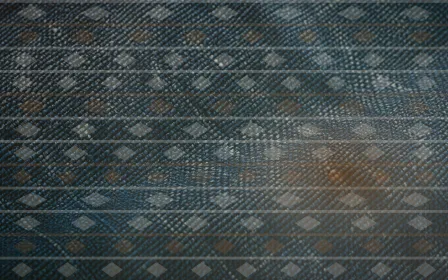 Ikat Museum Light — colourful brown, green and beige ikat background