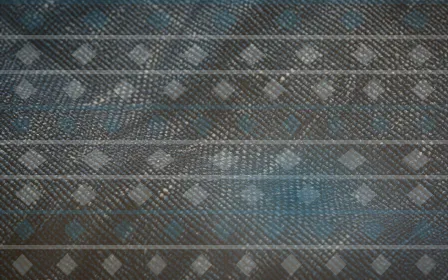 Ikat Warm Studio — colourful blue, orange and white ikat background